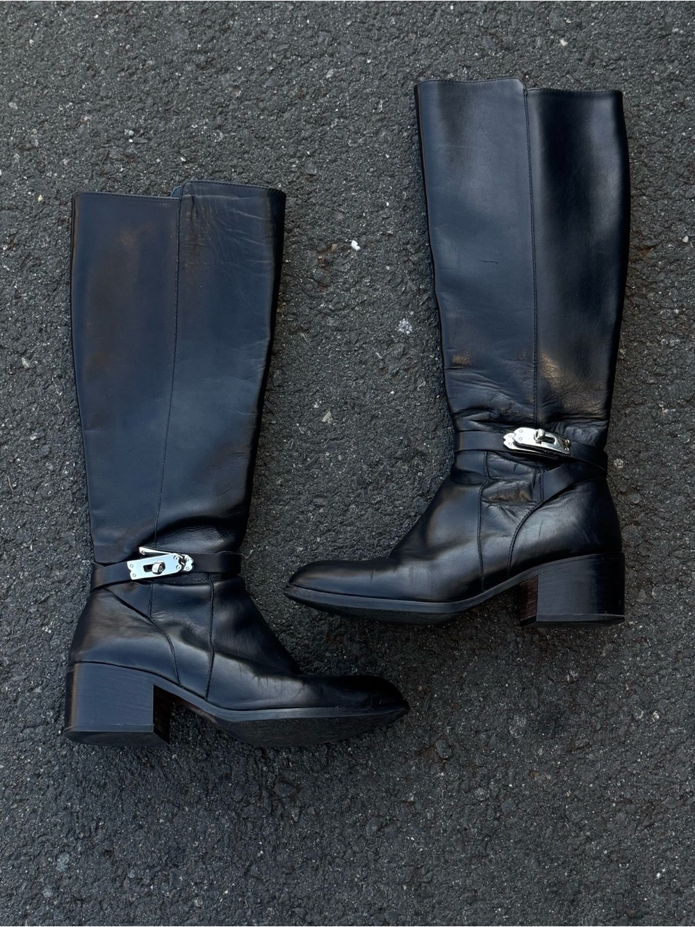 Knee-High Black Leather Riding Boots with Silver Buckle